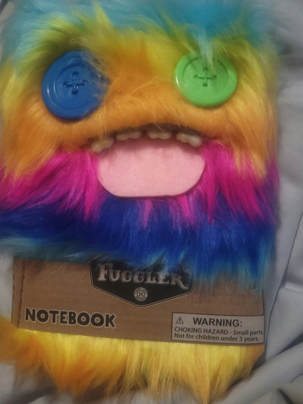 Fuggler Furry Notebook in a rainbow design,